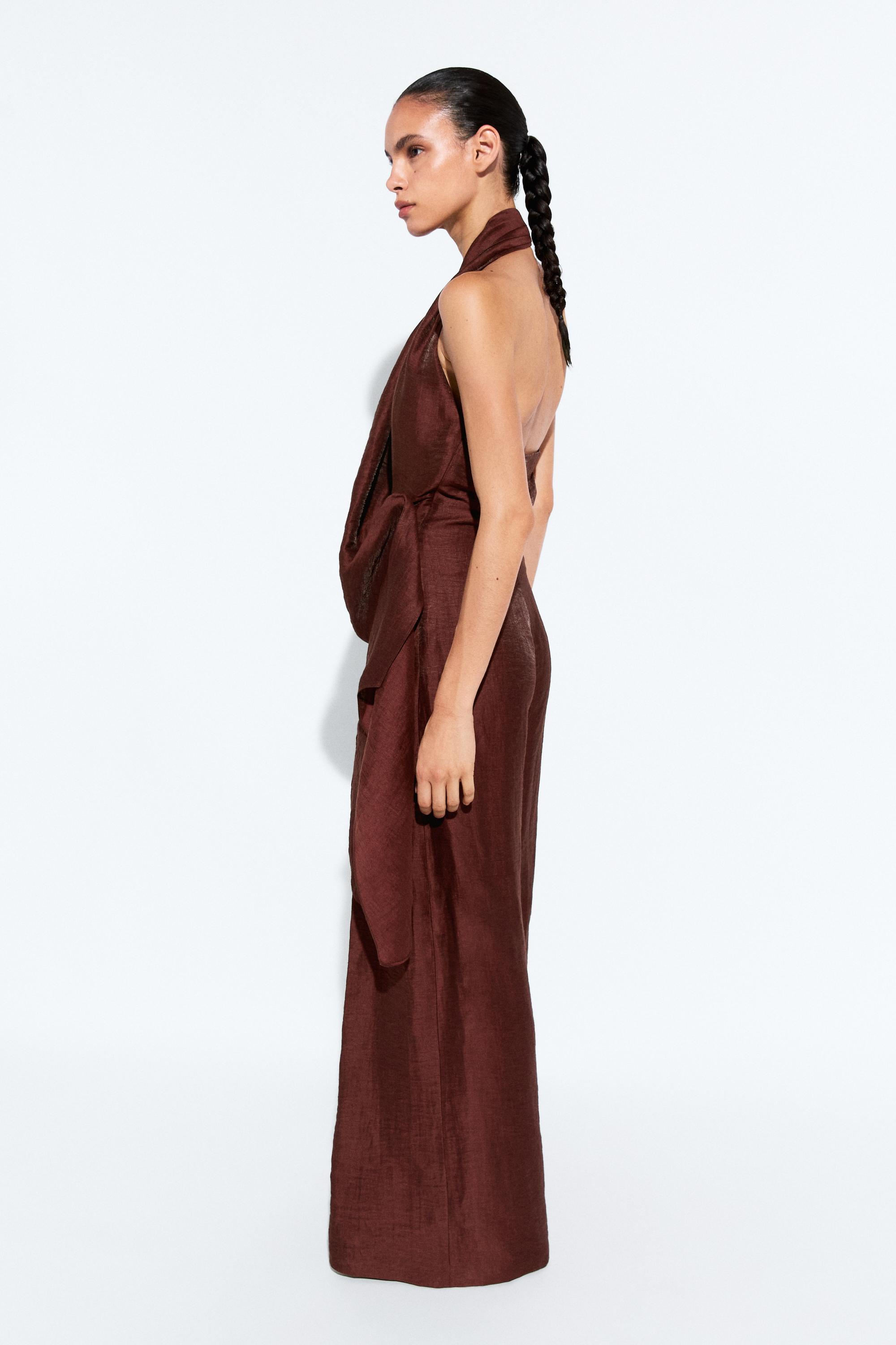 Flowing draped halter neck jumpsuit